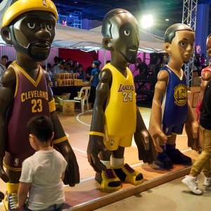 Big-headed basketball players. Would be cool if they were bobbleheads!