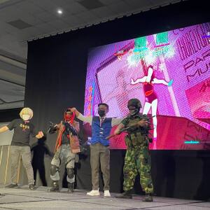 Just Dance stage with some cosplayers